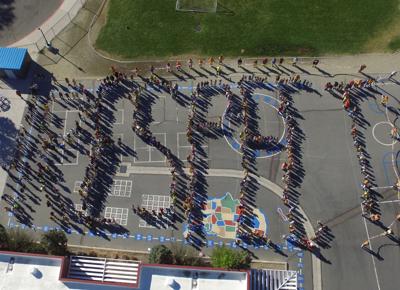 Respect word by students gathered .jpg