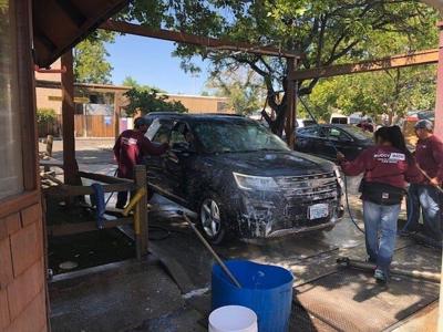Burners Line-Up at Car Wash to Remove Playa Dust