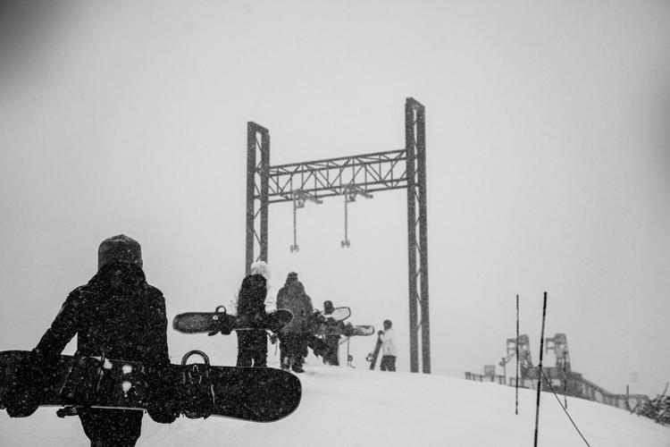 Boarders ready to break in the fresh powder.