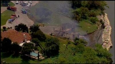 Crews Burn House Teetering on Texas Cliff