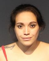 Woman Hanging On Hood of Car Arrested