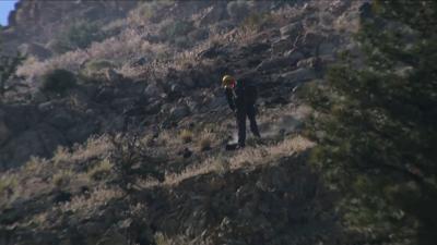 Firefighter assisting with O'Brien Fire - Photo