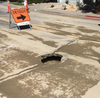 Crews Repairing Asphalt Collapse in Caughlin Ranch