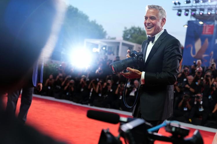 George Clooney honored as Venice Film Festival opens, in photos