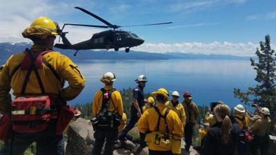 Sierra Front Wildfire Cooperators with helicopter