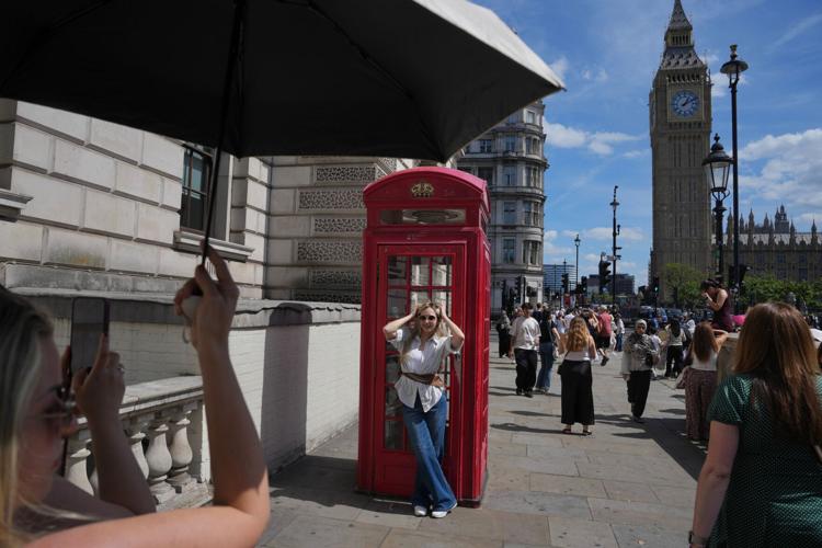 Britain records its hottest day of the year as summer heat grips parts of Europe, in photos