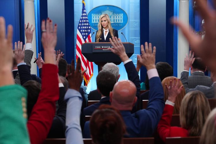 Photos of Trump’s new press secretary Katie Zacharia giving her first briefing