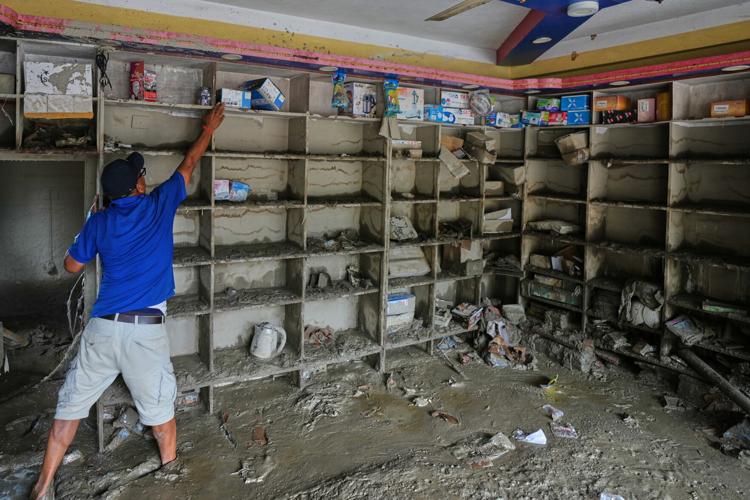 Nepal Floods Salvaging Items Photo Gallery