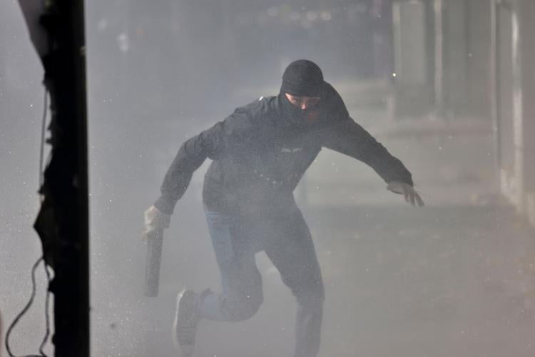Tear gas, fires and clashes as anti-government unrest escalates in Albania, in photos