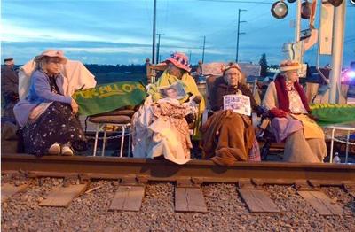 Protesters Block Train Tracks to 2 Washington Refineries