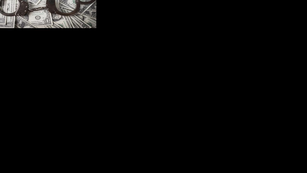 Handcuffs and money.jpg