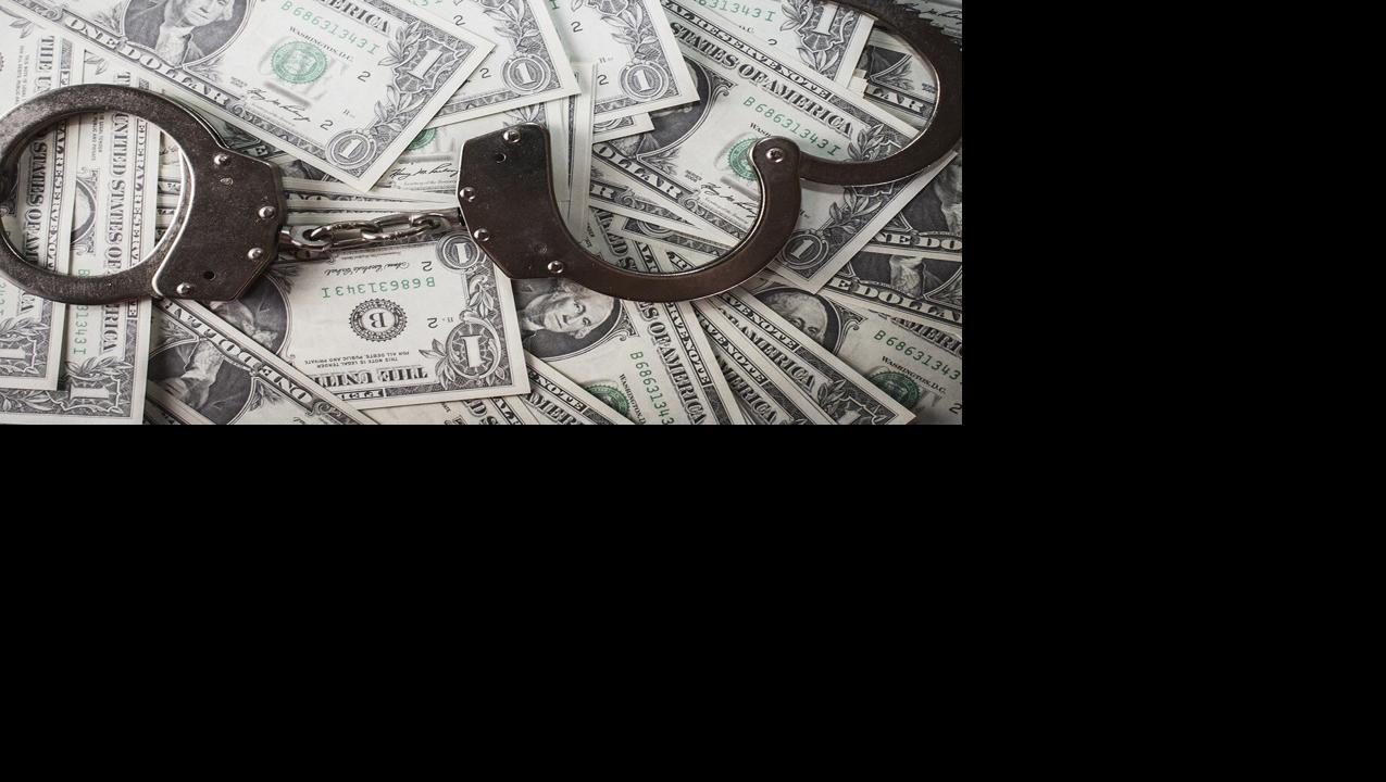 Handcuffs and money.jpg