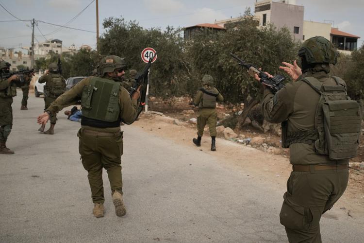 Photos show Israeli settler attacks disrupting the West Bank olive harvest