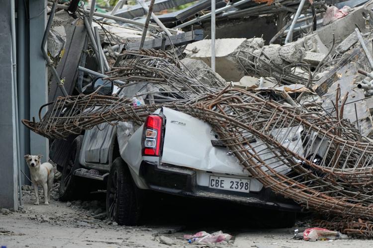 Photos show the aftermath of a building collapse in the Philippines