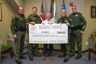 WCSO check presentation for REMSA care flight families.PNG