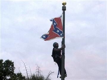 Woman Removes Confederate Flag from SC Statehouse