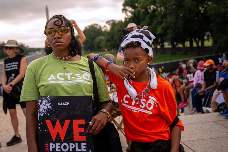 Thousands march in Washington to defend voting rights, in photos