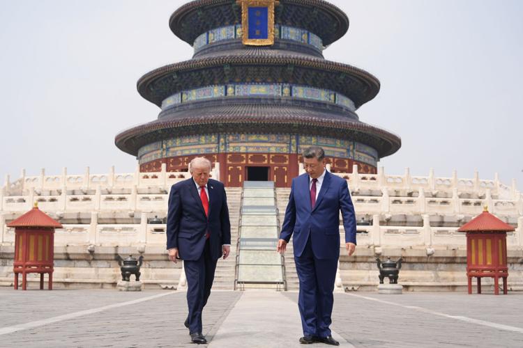 Photos of Trump in China for talks with Xi Jinping