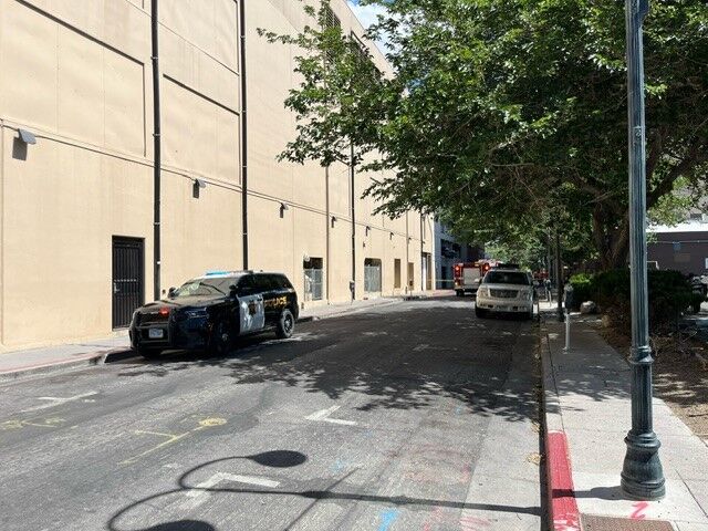roff and 1st car over ledge of parking garage