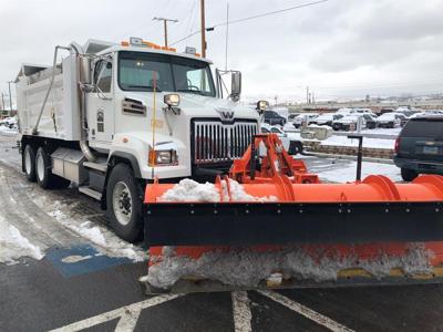 Crews Work Early to Clear Snow