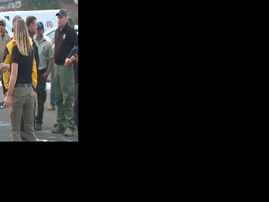 Tim Walz visits first responders at Davis Incident Command at Galena High School