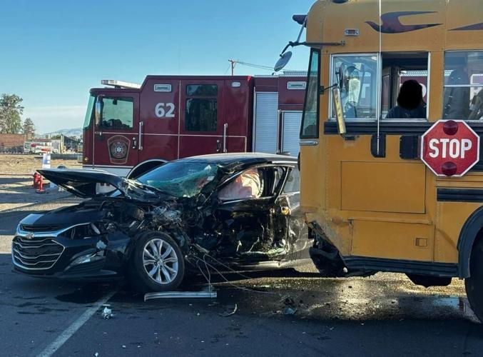 School bus hits car