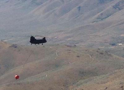National Guard Utilizes Helicopters to Fight Fires