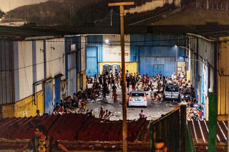 Migrants cross into Spain’s Ceuta enclave from Morocco, in photos