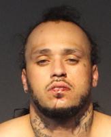 Man Arrested For Multiple Felonies After Crashing Into Building, Parked Car On East Prater Way