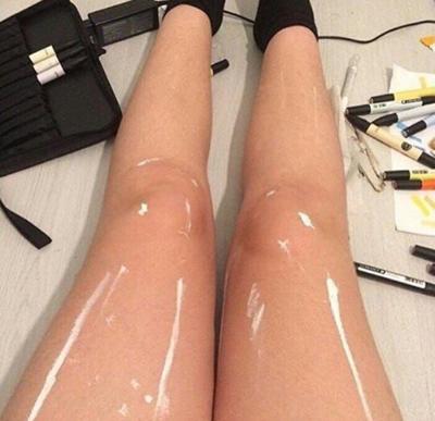 Twitter Debate Rages Over Photo of Shiny or Painted Legs