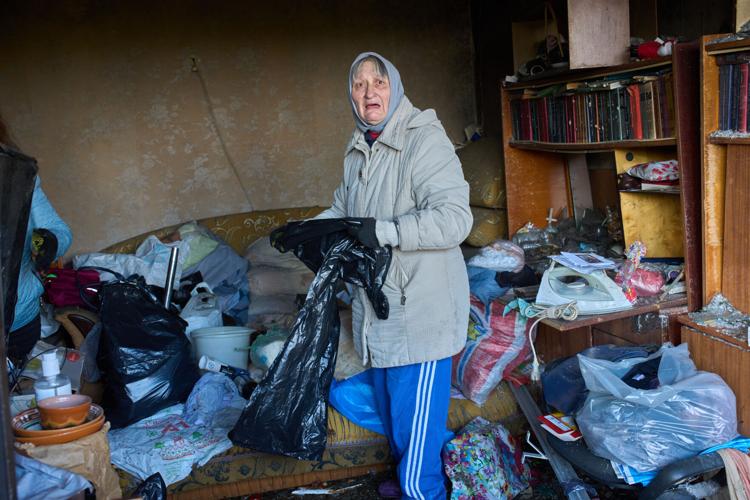 Photos of Ukrainian residents escaping their burning homes after deadly Russian attacks