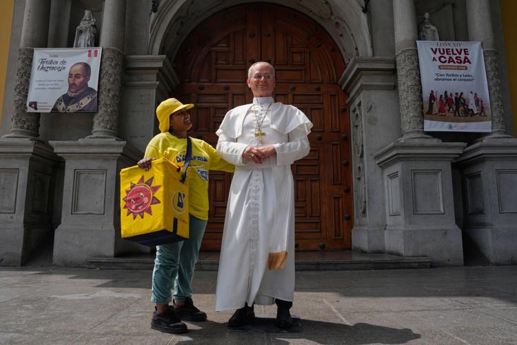APTOPIX Peru Pope Statue