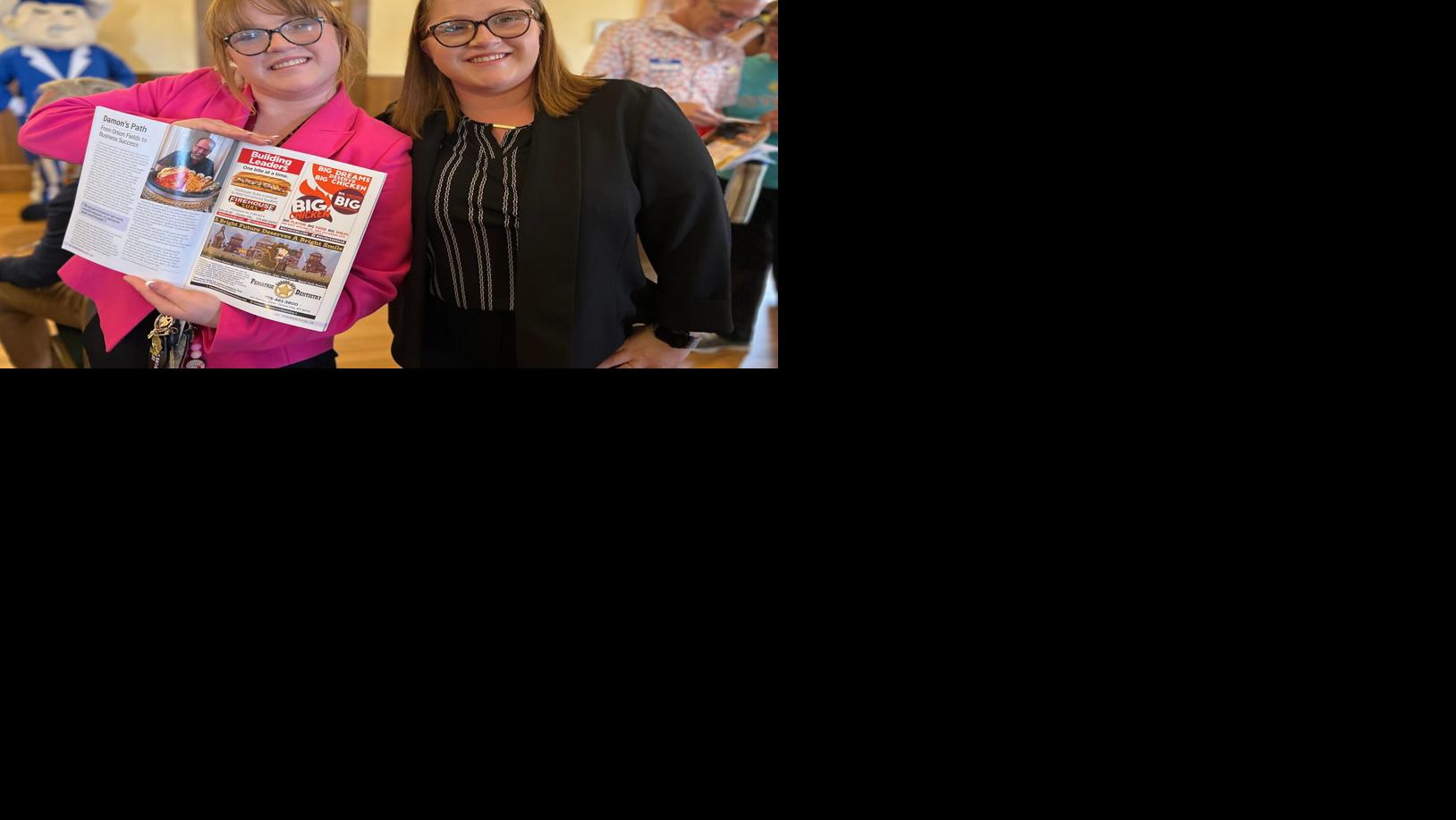 Carson High FBLA students show off the Entrepreneurs in Action Magazine at the launch party Thursday, April 10