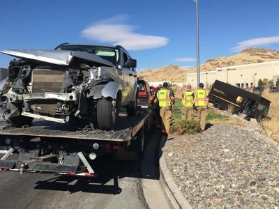 SUV Driver Suffers Minor Injuries After Hit by UPS Truck