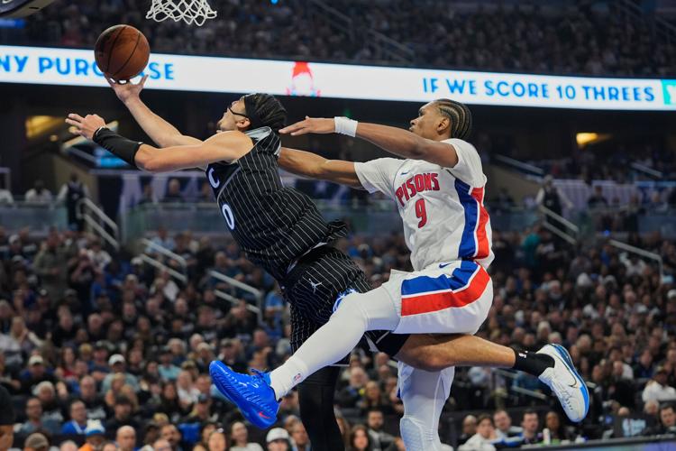 APTOPIX Pistons Magic Basketball