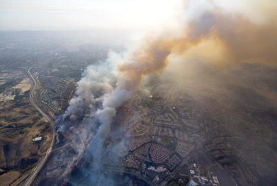 U.S.,States Struggle to Pay Spiraling Cost of Fighting Fires