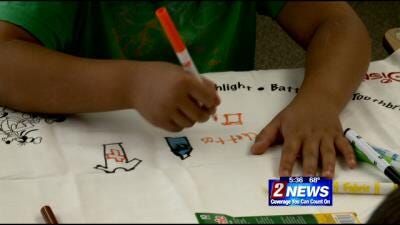 Red Cross Shows Students How to Make a Pillow Disaster Kit
