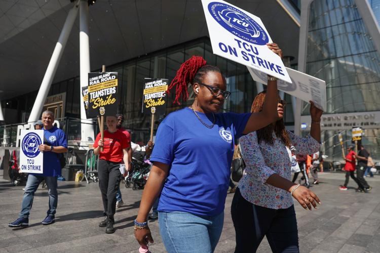 Photos show strike action as North America’s largest commuter rail system shuts down