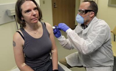 Coronavirus Vaccine Test Opens as U.S. Volunteer Gets First Shot