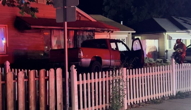 Car hits Sparks home