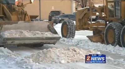 City Snow Crews Struggle to Catch Up After Storm