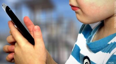 Cell Phone Kid Big.JPG