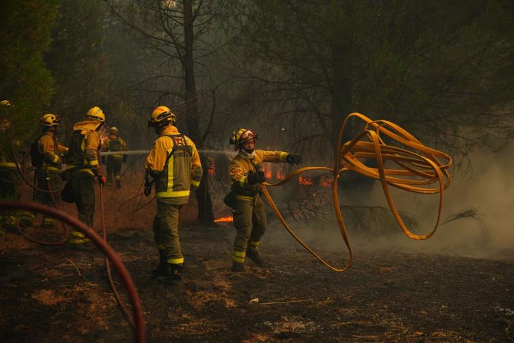 Europe battles fast-moving wildfires sweeping across Spain and France, in photos