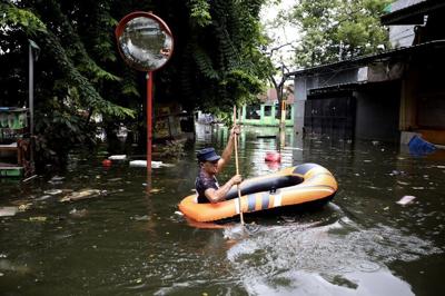 60 Dead In Landslides, Flash Floods In Indonesia's Capital