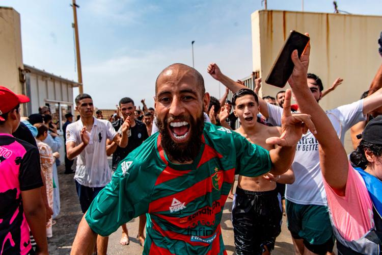 Migrants cross into Spain’s Ceuta enclave from Morocco, in photos