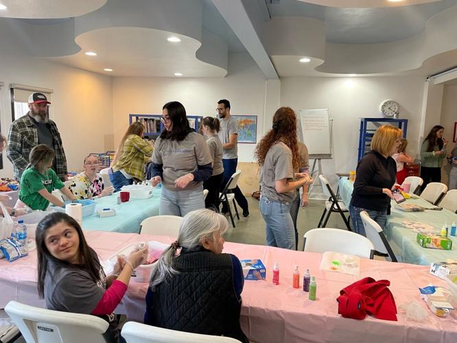 The Down Syndrome Network of Northern Nevada Holds Family Sock Tie Dye Event