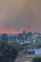 Fast-moving wildfire amid shifting winds threatens Reno, Nevada, forcing thousands to evacuate
