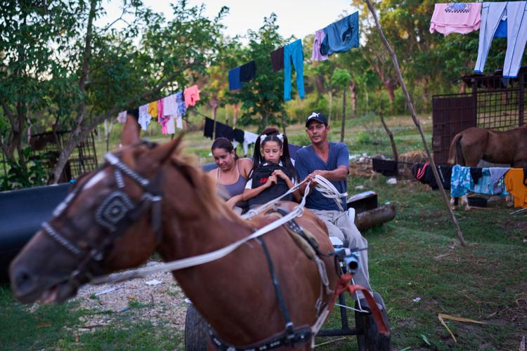 Photos of Cuban students returning to school as they face power and fuel shortages