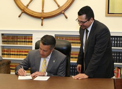 Governor Sandoval Signs AB 162 Allowing Green Cards to be Used as Proof of ID
