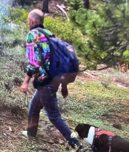 Douglas County fire suspect with dog